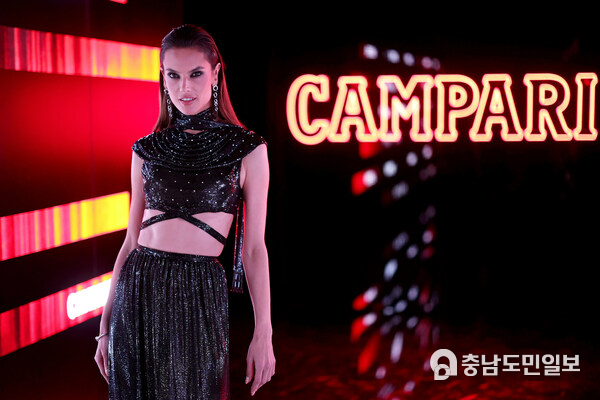Iconic model, Alessandra Ambrosio, attends the Campari: Discover Red event experience during the 76th Festival de Cannes, celebrating the unforgettable creations of cinema. Iconic model, Alessandra Ambrosio, attends the Campari: Discover Red event experience during the 76th Festival de Cannes, celebrating the unforgettable creations of cinema.