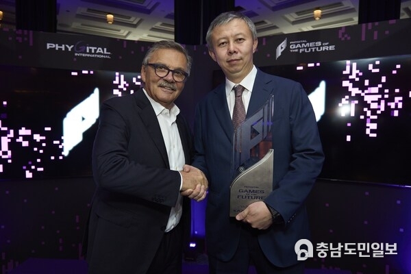 Rene Fasel, Founder of Phygital International (L) congratulates Yerbol Myrzabossynov, Minister of Tourism and Sports for the Republic of Kazakhstan Rene Fasel, Founder of Phygital International (L) congratulates Yerbol Myrzabossynov, Minister of Tourism and Sports for the Republic of Kazakhstan